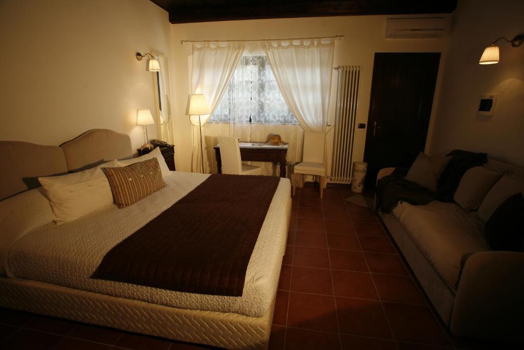 La Maragliana Aparthotel Castel Rocchero Camera foto